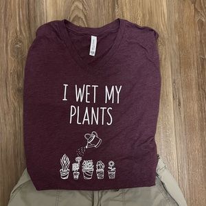 Fun t-shirt, burgundy in color. Brand new.  For the plant enthusiast.